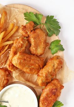 fried chicken and french fries with dipping sauce