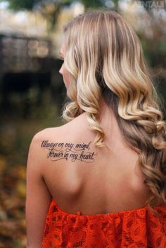 the back of a woman's shoulder with an inscription on it that says, whenever my magic is forever in my heart