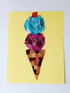 an ice cream cone made out of scrap paper