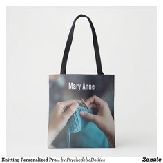 a tote bag with the words mary anne written on it and someone crocheting