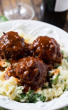 meatballs and mashed potatoes on a white plate