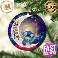 an ornament hanging from a christmas tree with the image of stitch and stitch on it