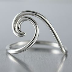 Create a splash at the beach this summer with this .925 sterling silver spiral wave ring. A summer fun boho inspired statement piece that makes for a unique gift for those who love sailing, surfing and sun bathing. A lover of the ocean myself this nautical design is one of my favorites. Nice and light to pack on your next warm destination vacation. SIZES: 3 to 16 MORE SILVER RINGS: https://www.etsy.com/ca/shop/JenniferWoodJewelry?ref=seller-platform-mcnav&section_id=37080248  Established Etsy Se Elegant Rings For Summer Beach Occasions, Elegant Summer Beach Rings, Minimalist Silver Rings For The Beach, Wavy Sterling Silver Beach Jewelry, Adjustable Spiral Jewelry For Beach, Ocean-inspired Silver Rings For The Beach, Nickel Free Sterling Silver Rings For Beach, Nickel-free Sterling Silver Rings For The Beach, Surf Jewelry