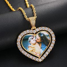 "Personalized Heart Photo Pendant, Picture Necklace, Rhinestone Double-Sided Rotating Charm, Silver and Gold, Mother's Day, Graduation gift Personalize this pendant with a photo of your partner, baby, parent, grandparent, children, friend, pet, or your wedding photo. Heart shaped pendant comes in gold-plated or silver-plated with artificial diamond rhinestones. Charm is a double-sided design and rotates to show image on both sides. Choose image and text, or image on each side.  Makes a great gift for an anniversary, birthday, Valentine's Day, Mother's Day, Father's Day, Christmas, engagement, graduation, wedding, in memory, or just because.  Add a matching silver-plated or gold-plated snake chain necklace with lobster clasp for an additional cost. Necklace measures 1.2mm wide and comes in Valentine's Day Gold Rhinestone Jewelry, Valentine's Day Double Heart Rhinestone Jewelry, Double Heart Rhinestone Jewelry For Anniversary, Personalized Heart-shaped Crystal Necklace, Heart Necklace With Rhinestones For Valentine's Day Anniversary, Valentine's Day Heart Necklace With Rhinestones For Anniversary, Valentine's Day Rhinestone Heart Necklace For Anniversary, Valentine's Day Anniversary Jewelry With Rhinestones, Valentine's Day Anniversary Rhinestone Jewelry