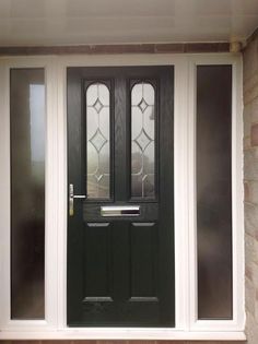 a black front door with two glass panels