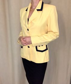 "Very good vintage condition. A fab 90s blazer. Primary yellow and navy blue. With shoulder pads.this item cleaned and ready to wear.  Measurements:  Sleeves lenght: 60 cm (23.6\") Lenght: 64 cm (25\") Width: 39,5 cm (15.5\") Model size small. Better fit medium size. I always dispatch all my items within 1-3 business days. All items sended are send by standart shipping. -Please note that all items in my shop are vintage and may have signs of wear and age including scratches, tarnishing etc. Please see photos for quality.  -Also please review and feel free to ask any questions you might have.  -Thank you for taking the time to look at my item why don't you check through my other items while you are here." Yellow Fitted Blazer For Work, Classic Yellow Blazer For Business, Classic Single-breasted Yellow Blazer, Yellow Notch Lapel Blazer For Work, Yellow Single-breasted Notch Lapel Blazer, Classic Yellow Blazer For Office, Retro Spring Blazer For Office, Vintage Yellow Formal Blazer, Yellow Vintage Blazer For Formal Occasions