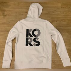 Michael Kors Men’s Graphic Logo Cotton Blend Pullover Hoodie White Nwt S - L White Logo Sweatshirt For Winter, White Long Sleeve Hoodie With Logo, White Logo Hoodie For Streetwear, White Logo Hooded Sweatshirt, White Hooded Logo Sweatshirt, White Hooded Sweatshirt With Logo, Casual Hooded Tops With Logo Detail, White Crew Neck Hoodie With Logo, White Crew Neck Hoodie With Logo Detail