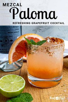 a grapefruit cocktail is garnished with fresh mint