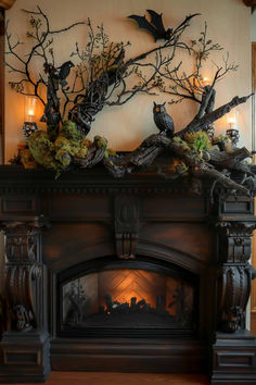 a fireplace decorated with halloween decorations and bats