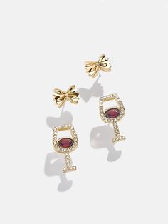 Carb lovers, this one's for you. Our Endless Pastabilities Earring Set includes pave wine glasses paired with bowtie pasta stud earrings. The wine glasses are crafted with dainty stones to resemble your favorite red wine. Fastened with post back closures, mix and match these gems to represent your everyday pasta cravings. Please note this only comes with two set of earrings, the red wine and bowtie pasta. Pasta Earrings, Wine Earrings, Gold Medallion Necklace, 2024 Wishlist, Apple Earrings, Crystal Anklet, Novelty Earrings, Cocktail Earrings, Bowtie Pasta