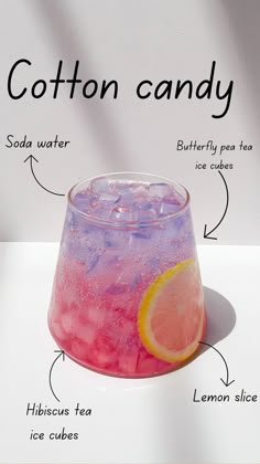 a pink and purple drink with labels on it