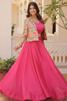 Step into the spotlight with our exquisite Designer Lehenga Choli, paired with a stylish Koti. Crafted from luxurious Chinon fabric, this ensemble is designed to make you shine at any function. Crop Top Lehenga With Koti, Koti Outfit Women, Chaniya Choli With Koti, Pink Choli Color Combos, Koti With Lehenga, Plain Choli Designs, Koti Style Chaniya Choli Latest, Marriage Choli Design, Koti Jacket Women