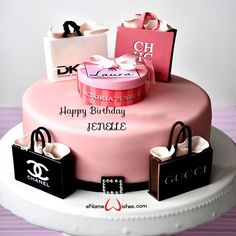 a pink birthday cake with shopping bags and name on the top is for a woman