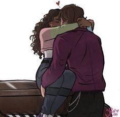 two people are hugging each other while sitting on a bench with their arms around each other