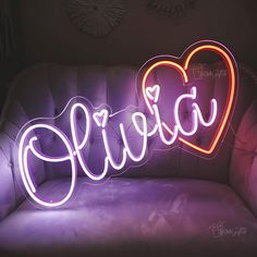 a neon sign with the word love spelled in it