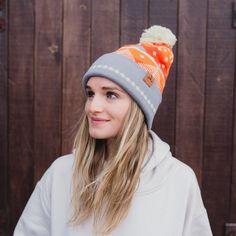 ALL SALES FINAL This Winter Sunset Pom Beanie is sure to warm your head and soul! Combining the cozy comfort of a beanie with a vivid, winter sunset design, it's the perfect way to brighten up the coldest of days. Embrace the cooler weather in style! A Montana Scene Original Design. All designs are property of The Montana Scene. All rights reserved.All of The Montana Scene apparel is designed and printed locally in Montana. Come visit our storefront locations! Bigfork * Whitefish * Missoula * Ka One Size Fits Most Bonnet For Outdoor Fall Use, Orange Beanie For Winter, Winter Orange Hat, One Size Fits Most, Winter Orange Adjustable Hat, Winter Orange Hat, One Size Orange Winter Hat, Orange Winter Hat, Sunset Design, Winter Sunset