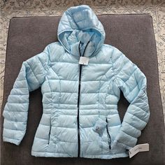 Ck Calvin Klein Women's Hooded Packable Puffer Coat Size Large The Quilted, Ultra Comfy Style Of This Puffer Coat Will Keep You Warm And Dry No Matter The Weather. A Packable Pick Designed With A Cozy Hood. -Packable Bag - Gathered Drawstring Mock Neck With Attached Hood - Long Sleeves - Front Zip Closure - 2 Slash Pockets - Quilted Accent - Imported -Packable Bag Calvin Klein Puffer Jacket Women’s Size Large Brand New With Tags Packable Calvin Klein Puffer Jacket, Ck Calvin Klein, Puffer Jacket Women, Calvin Klein Woman, Klein Blue, Comfy Fashion, Jacket Women, Puffer Coat, Womens Calvin Klein