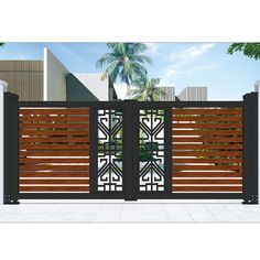 an iron gate with wooden slats and decorative designs on the sides, along with palm trees