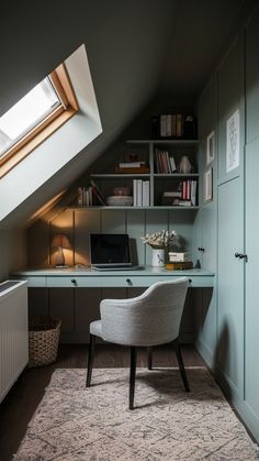 a room with a chair, desk and bookshelf under a slanted roof