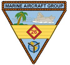 the logo for marine aircraft group, featuring a ship and palm trees in the background