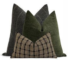 three pillows in different colors and patterns on a white background, each with a checkered design