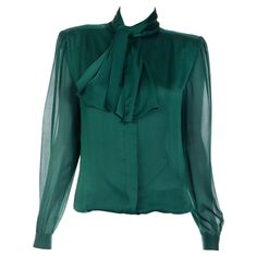 This is a luxe silk vintage Valentino Couture green silk blouse with an attached sash style neck tie that can be tied in a knot or bow. This beautiful blouse has sewn in shoulder pads for slight structure that could easily be removed. The sleeve cuffs have fabric covered button closures, and there are hidden green buttons down the center front of the top with a snap at the bottom and top for closure. Valentino Garavani designed this blouse with two elastic strings attached inside at the back tha Green Silk Blouse, Green Silk Top, Vintage Valentino, Valentino Couture, Silk Bow, Bow Blouse, Couture Vintage, Beautiful Blouses, Women Shirts Blouse