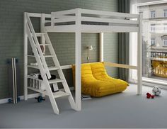 there is a bunk bed with a yellow chair next to it and a window in the background