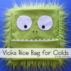 a close up of a stuffed animal on a blue background with the words vicks rice bag for colds