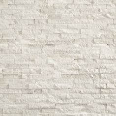 a white brick wall with no mortars on it