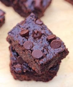 two chocolate brownies stacked on top of each other