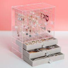 PRICES MAY VARY. 💎【TOP QUALITY】:This acrylic jewelry box is composed of tough,high-transparency acrylic.Picking out what you want is now a snap thanks to the transparent earring box's,which makes all of your favorite jewelry easily visible and dust-protected.It could be a earring organizer box for all your jewelry. 💎【SUPER LARGE CAPACITY】:This acrylic earring box with 3 different layouts velvet bracelet holder tray and 5 vertical earring stand drawer which could easy to store all your jewelry, Velvet Bracelet, Earring Holder Stand, Drawer Jewelry, Transparent Jewelry, Functional Jewelry, Jewelry Organizer Stand, Clear Jewelry, Bracelet Holder, Composite Board