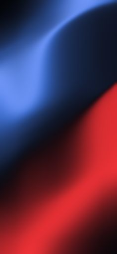 an image of a red and blue background that looks like silk or satine fabric