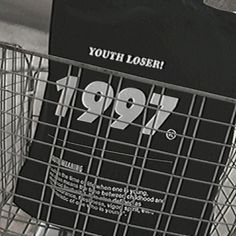 a black and white photo of a shopping cart with the number 1917 printed on it