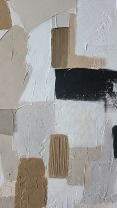 an abstract painting with black, brown and white squares on it's surface is shown