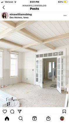 an empty room with white walls and wood beams on the ceiling is being remodeled by instagram