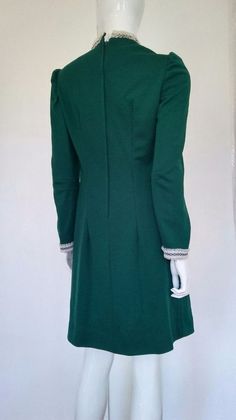 Classic 70's  DressEmerald green polyester material with white lace detailings.Size MediumExcellent ConditionZip backEmail for specific measurements Emerald Green Dress, Snakeskin Boots, Emerald Green Dresses, Vintage Biker, 70s Dress, Biker Leather, Powder Pink, Pump Shoes, Green Dress