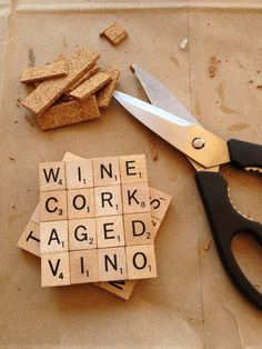 corks and scissors are laying on the floor next to wine corks that have been cut into smaller pieces