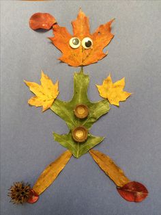 an autumn leaf craft with eyes and leaves