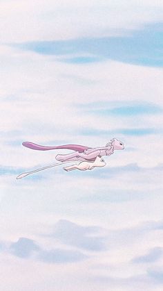 an animal flying in the sky with clouds