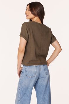 Upgrade from a classic tee with this cotton-gauze v-neck top in a boxy, cropped silhouette. In our signature beach gauze, this army green top travels well, combining both comfort and elevated-casual style. *100% Cotton *Body Length: 20" *Beach Gauze *Model is 5’8 1/2” and wearing size SMALL 53E-72294 Summer Cotton Cropped V-neck T-shirt, Casual V-neck Cropped T-shirt For Summer, Relaxed Cotton V-neck Top, Trendy Cotton Cropped T-shirt V-neck, Trendy Cotton V-neck Cropped T-shirt, Versatile Cotton V-neck Tops, Casual Everyday Cotton V-neck Top, Cotton V-neck Cropped T-shirt For Summer, Cropped Cotton V-neck T-shirt For Summer