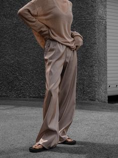 Chic and luxurious silky trousers with wide leg. Super comfortable. Wide leg creates relaxed flowing pants that are easy to wear. Model is in MINUSEY ONE SIZE. ✔️ Free worldwide express shipping over $100 ✔️ Loved by 6,500+ customers ✔️ Limited edition collections, maximum style ⠀⠀⠀⠀⠀⠀⠀⠀⠀ Stay ahead of the trend with can’t-find-anywhere-else staples. Your closet will thank you 💕 * MINUSEY ONE SIZE = EU 34-38, US2-6* 100% Polyester* Dry clean* Made in Korea - Model Height: 172cm/5'7" (US2, EU34) Elegant Beige Baggy Bottoms, Casual Silk Pants With Elastic Waistband, Casual Silk Wide Leg Pants With Elastic Waistband, Beige Wide Leg Pants For Fall, Beige Wide Leg Full Length Pants For Fall, Beige Full Length Wide Leg Pants For Fall, Chic Brown Wide Leg Full Length Pants, Chic Brown Wide Leg Full-length Pants, Chic Brown Full-length Wide Leg Pants