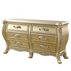 an ornately decorated gold dresser with drawers