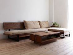 a couch and coffee table in a room