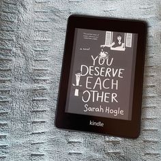 a kindle on a bed with a book about you deserves to teach other people