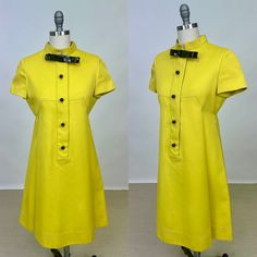 Vintage 1960s Designer Teal Traina New York Mod Dress Yellow Acetate Short Sleeve with Plastic Bowtie Black Buttons. Here we have a 1960s Teal Traina mod dress. It is a yellow/lime green color and made from a synthetic acetate material. The interior is lined with a silky acetate. It features a center front zipper with snap buttons overtop that look like real buttons. It is shortsleeved and falls to the knees. There is a large box please on the front and back of the dress at the waistline. This p Yellow Lime, Dress Yellow, Mod Dress, Black Button, Vintage 1960s, Yellow Dress, Front Zipper, Green Color, Lime Green