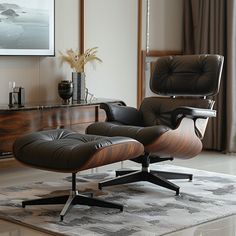 an eames chair and ottoman in front of a painting on the wall with a large window