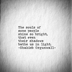 an old typewriter with the words, the souls of some people shine so bright that even their shadows bathe us in light