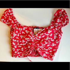 Nwt Zara Sweetheart Ruched Floral Crop Top. Size Xs. New, Never Worn. As Seen On Emma Roberts In The Movie Holidate. Feel Free To Make An Offer Or Contact Me With Questions! Fitted Ruched Zara Tops, Summer Red Ruched Top, Cute Fitted Zara Top, Fuzzy Top, Orange Crop Top, White Crop Tank, White Crop Top Tank, Satin Crop Top, Pretty Shorts