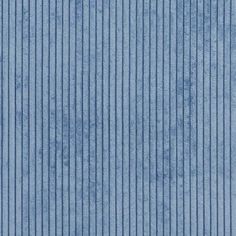 a blue wallpaper with vertical lines on it