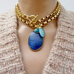 Handcrafted necklace, large vintage Lapis Lazuli pendant gold electroplated, a stunning vintage chain, a gorgeous vintage toggle clasp, a small green Agate gemstone tear drop charm and a larger vintage Amazonite gemstone pendant. Wear it long or doubled with jeans and a t-shirt for a super chic and stylish look. Lapis Luxury Lapis Lazuli Necklace, Luxury Antique Gemstone Necklaces, Elegant Brass Toggle Necklace, Artisan Gold Teardrop Pendant Jewelry, Elegant Necklaces With Lobster Clasp For Accessorizing, Elegant Blue Brass Necklace, Elegant Gold Toggle Necklace With Gemstone, Elegant Gemstone Toggle Necklace Gift, Elegant Gold Toggle Necklace With Natural Stones